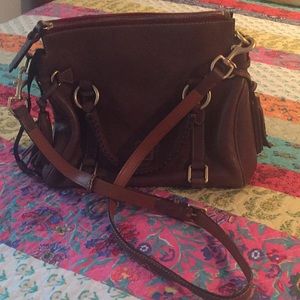 Women’s Dooney & Burke purse.